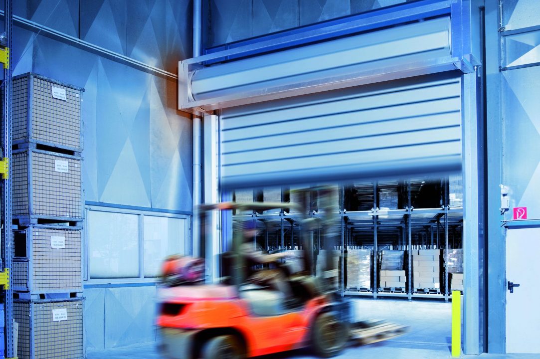 EFA-SST TK-100 deep freeze spiral door in a warehouse loading area