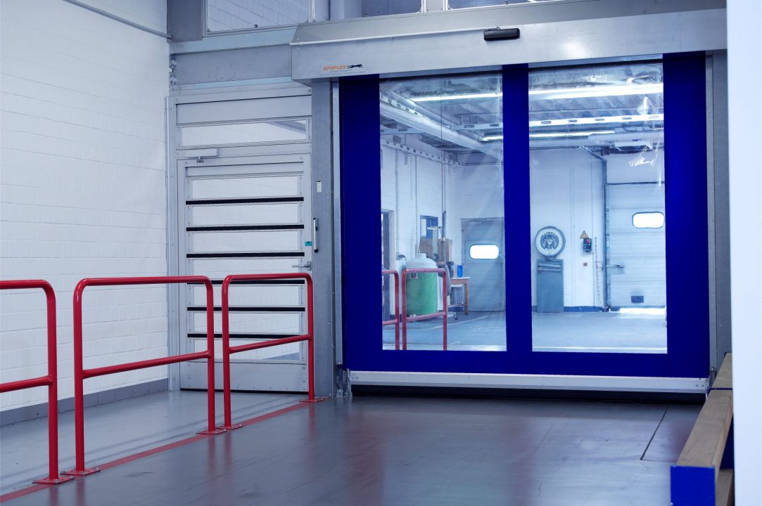 Blue EFA-SRT Premium fabric high speed door in an industrial setting