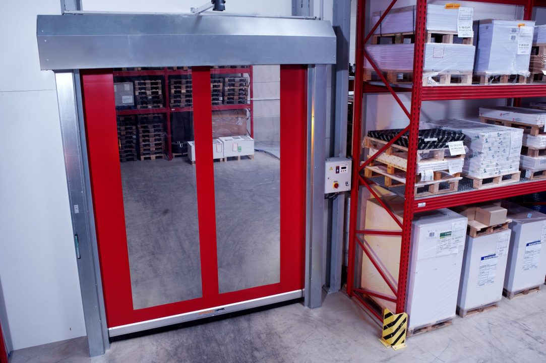 Red EFA-SRT Premium fabric high speed door installed indoors