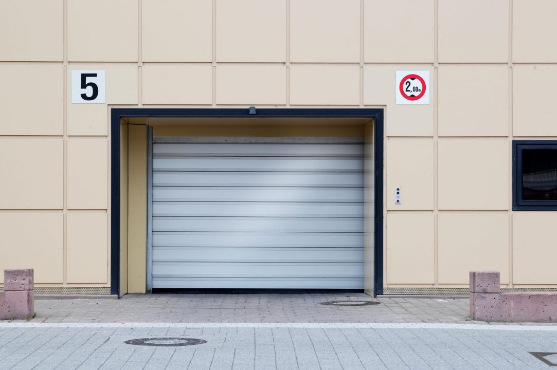 White ISO Spiral insulated door, canopy-ready outdoor installation