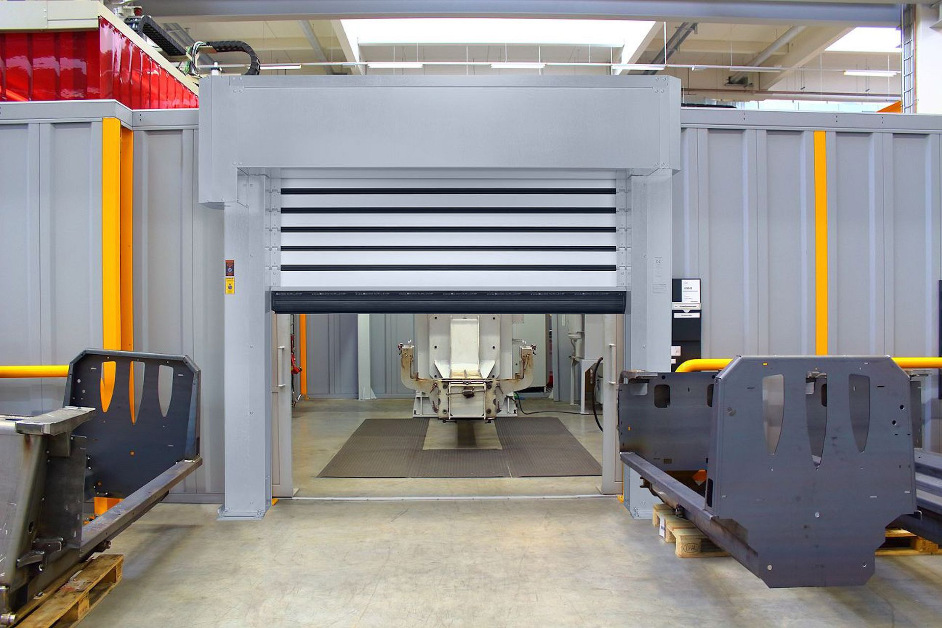 Machine guarding view showing the EFA-SST MS spiral safety door in operation
