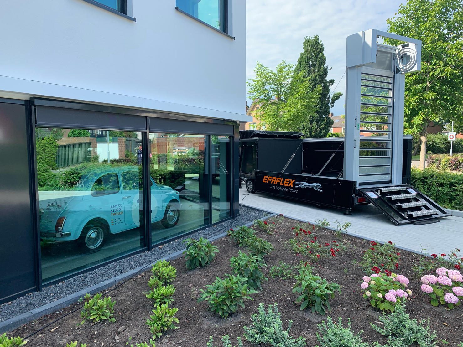 EFAFLEX Door Trailer set up on site with the high-speed door deployed