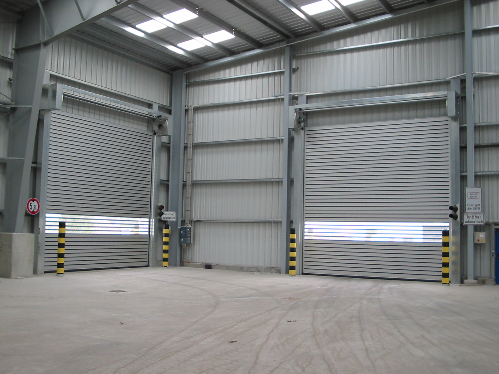 EFAFLEX high speed spiral doors installed in a waste management and recycling facility